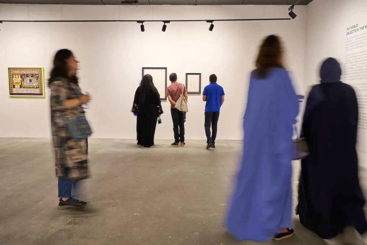 Visitors in a past exhibition at the Jeddah branch of ATHR Gallery