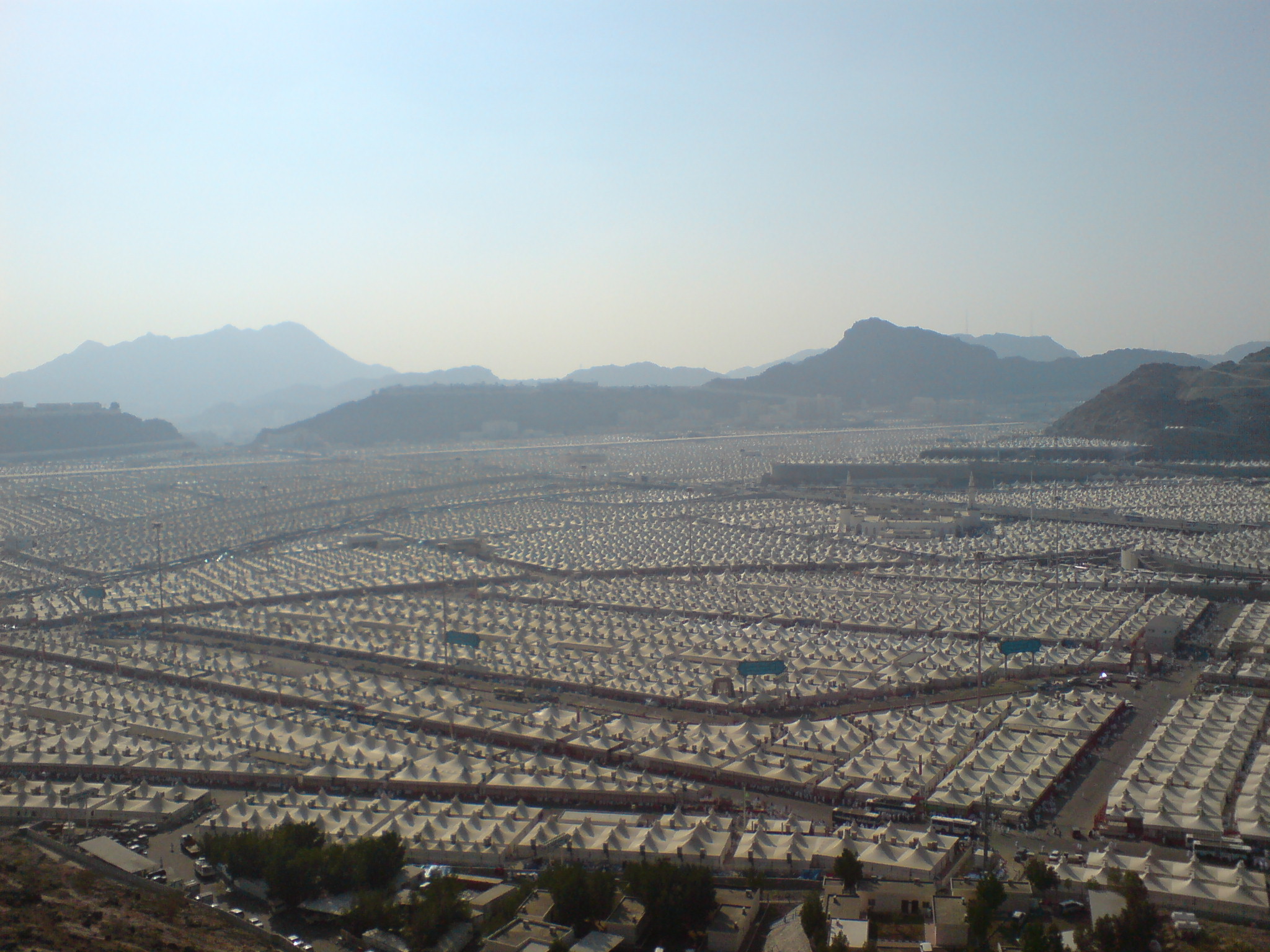Historical elevated view across the tented valley of Mina