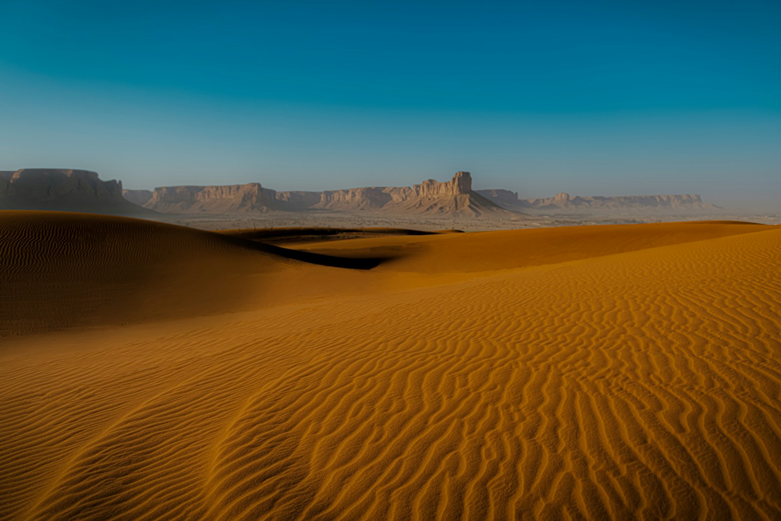 Red sand dunes and desert hills near Riyadh