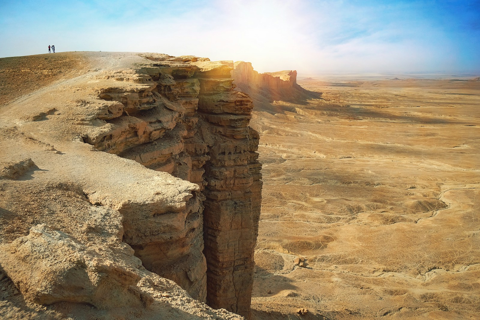 A visitor against the dramatic rocky scenery near Riyadh
